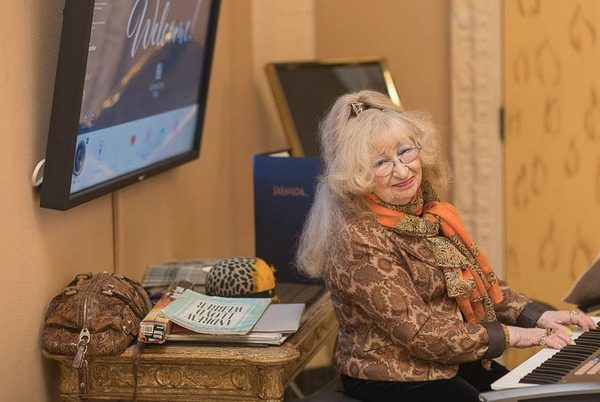 Woman keyboardist in lobby